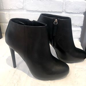 Size 8 leather booties, 3 inches heels, by Lê Chateau.